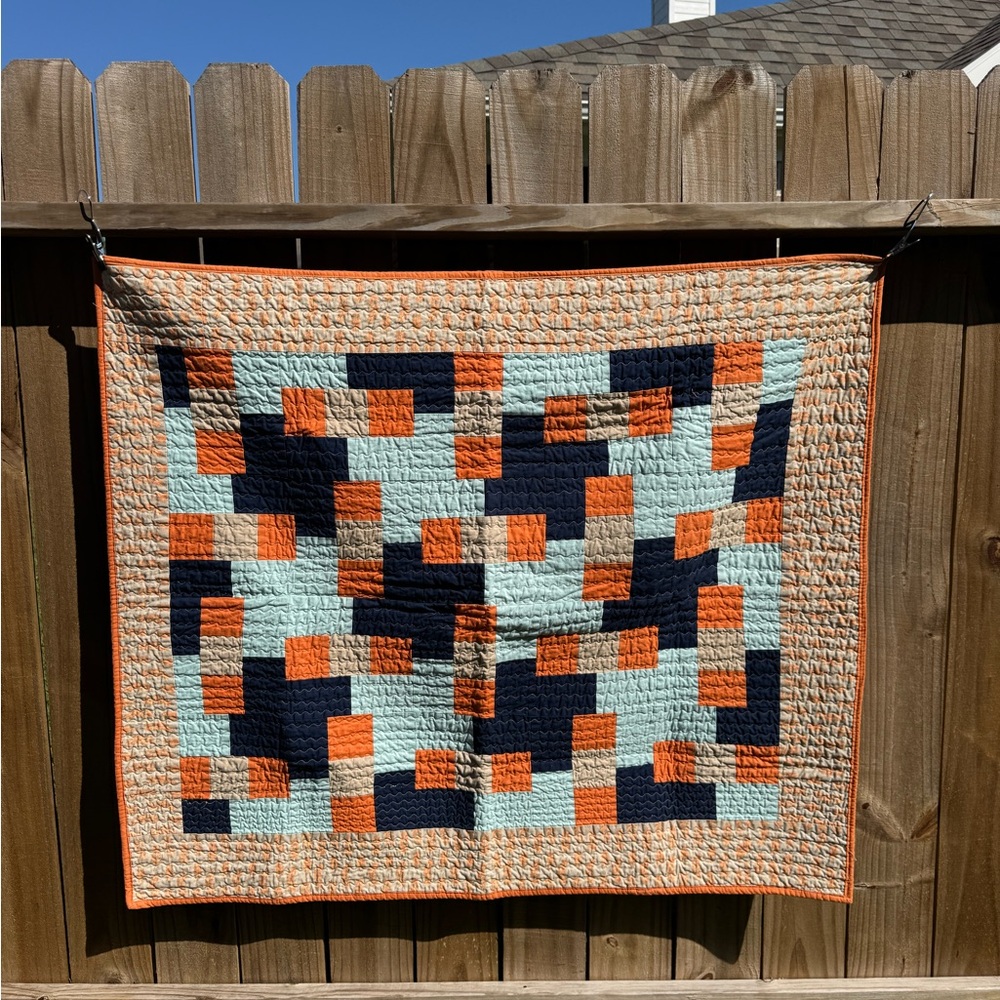 Patchwork baby Quilt in Orange, Blue, and Cream